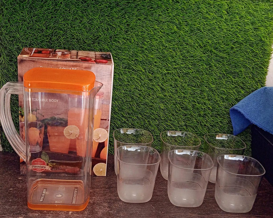 Resistant glass jug with thick walls for added durability and safe beverage storage.