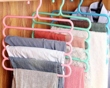 5-layer multipurpose plastic hanger in use with clothes