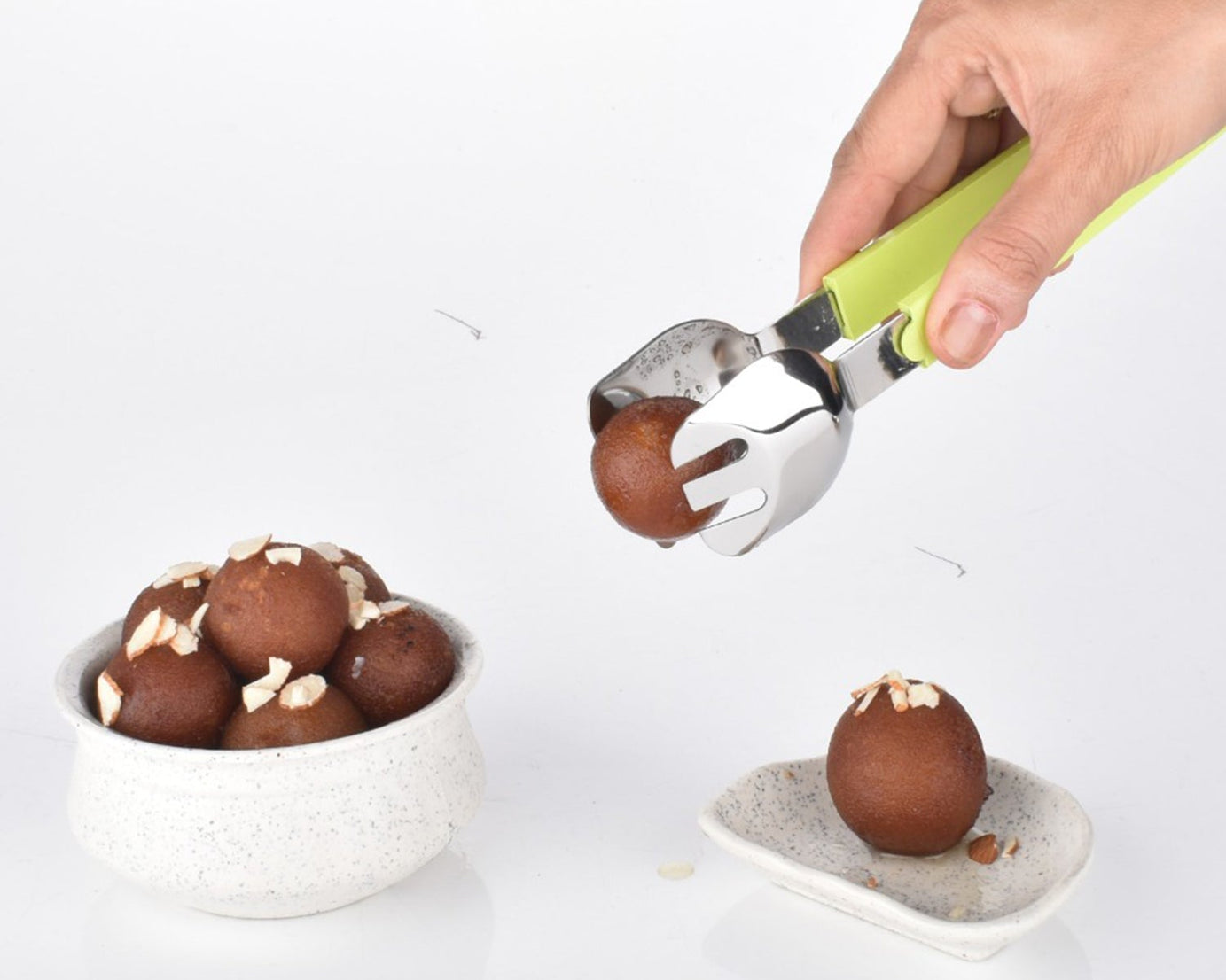 Sturdy multi-use tongs for effective food serving and grabbing.