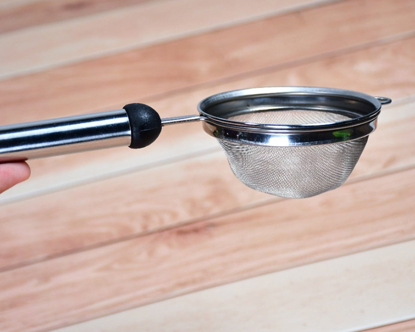 Tea and juice strainer made of stainless steel