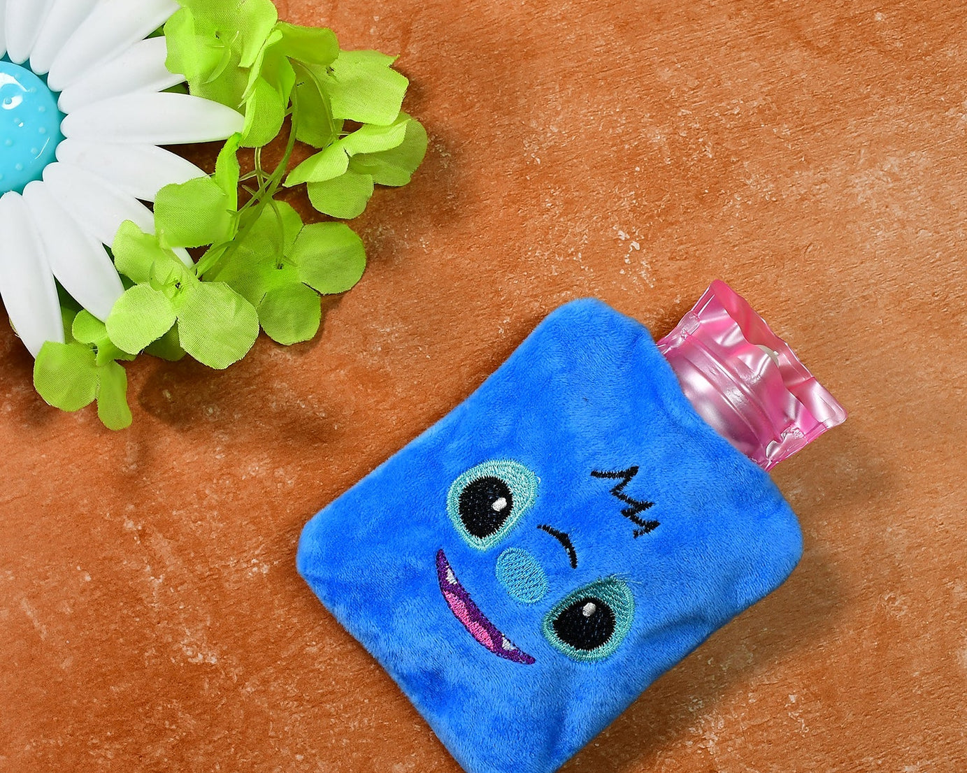 Blue stitch hot water bag with cover for pain relief and warming
