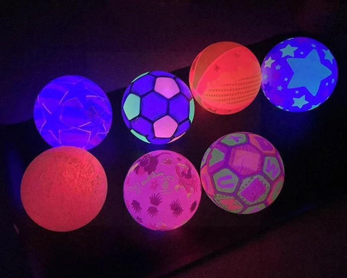 Close-up view of the bouncy LED ball, emphasizing its rubber material and colorful design