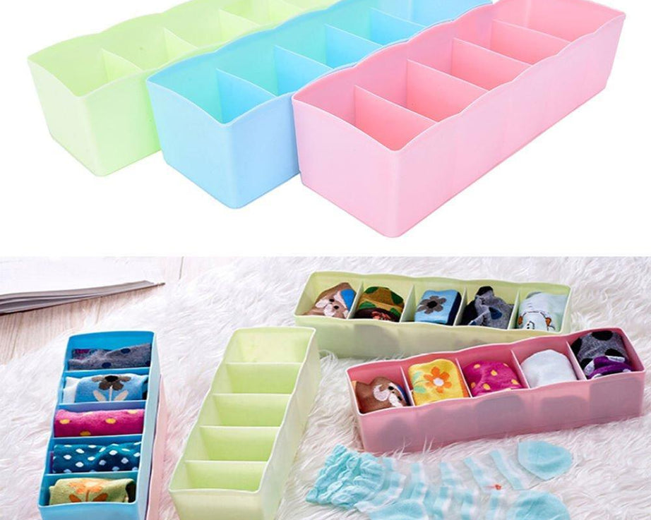 Storage box with 5 compartments for efficient organization of socks and handkerchiefs.