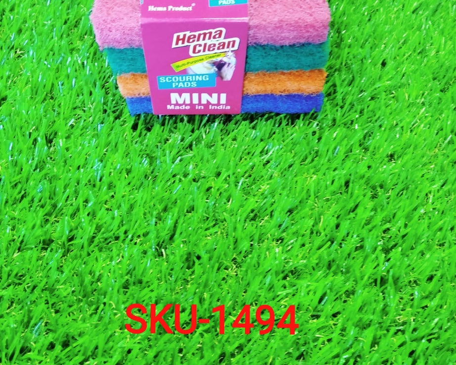 Four green scrub pads for cleaning utensils and tiles