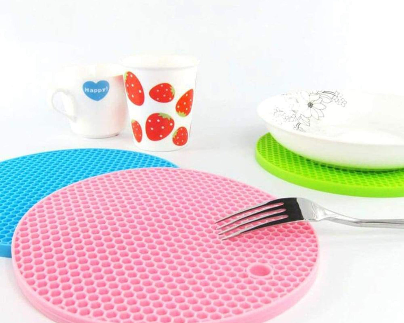 Silicone hot mat designed to protect surfaces from hot cookware with a flexible material.