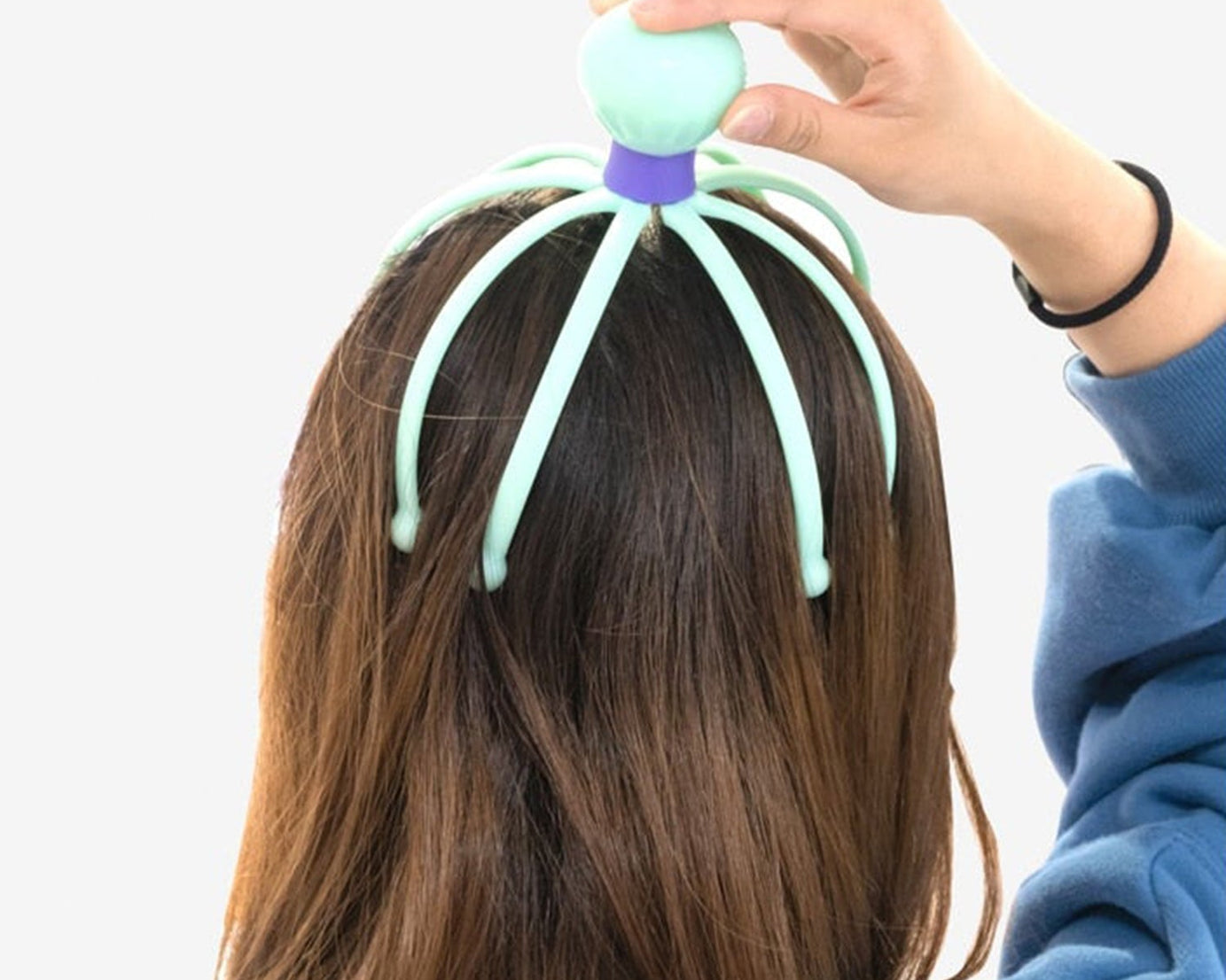 Stress relief and therapeutic scalp massager with an octopus design, emphasizing its function