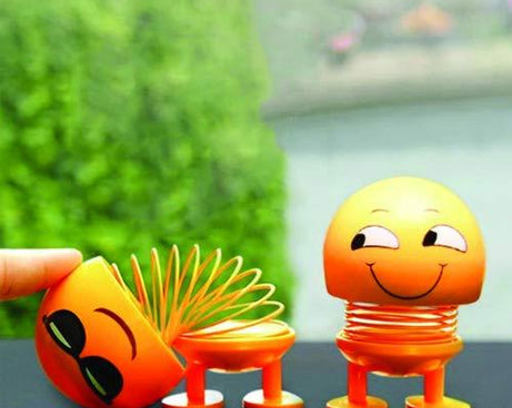 Smiling face spring doll emoticon