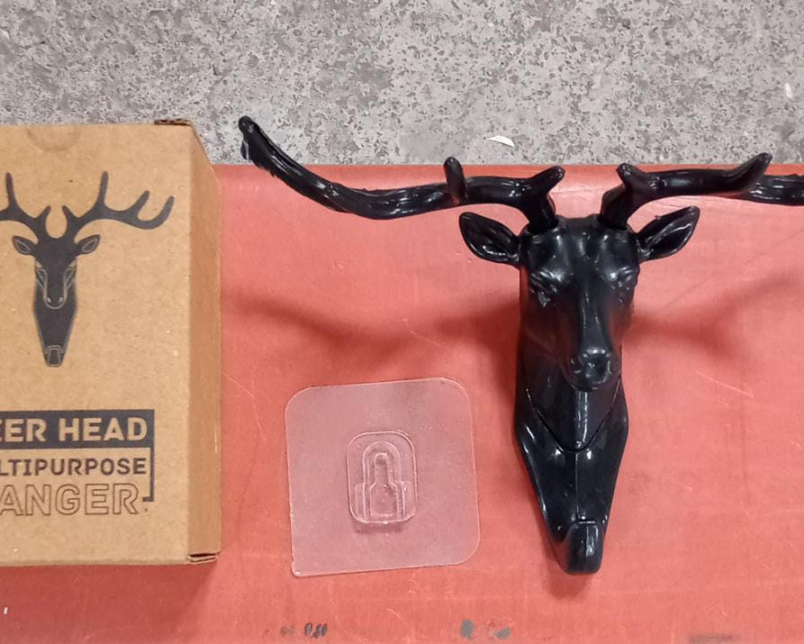 Deer head hook with self-adhesive backing for convenient hanging