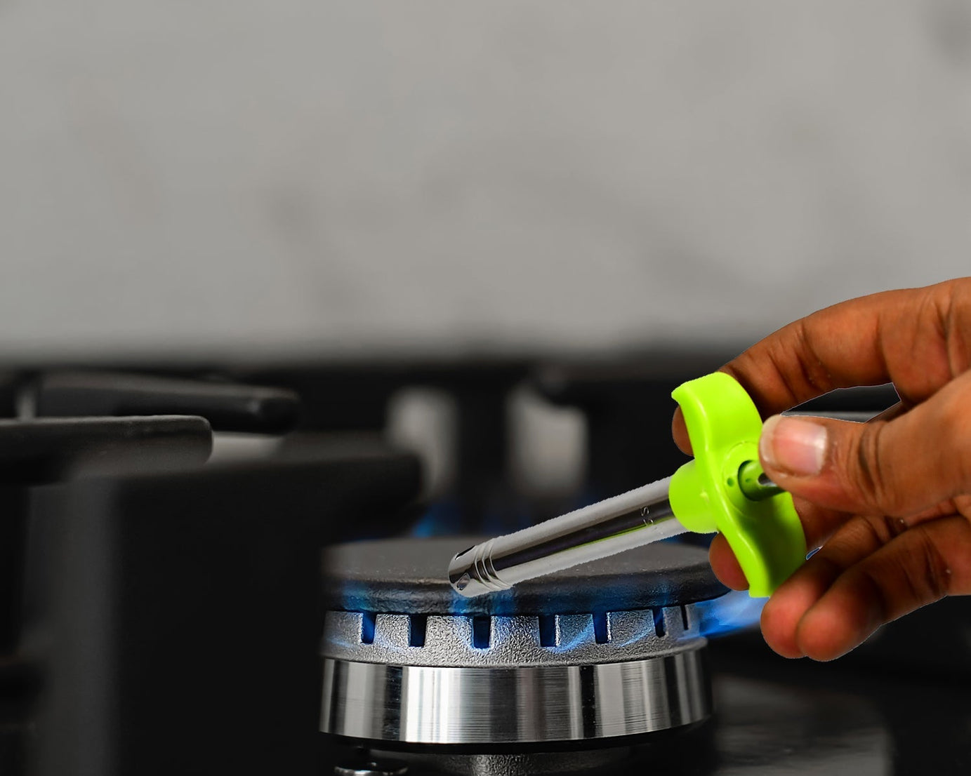 Ganesh lighter with integrated knife and peeler