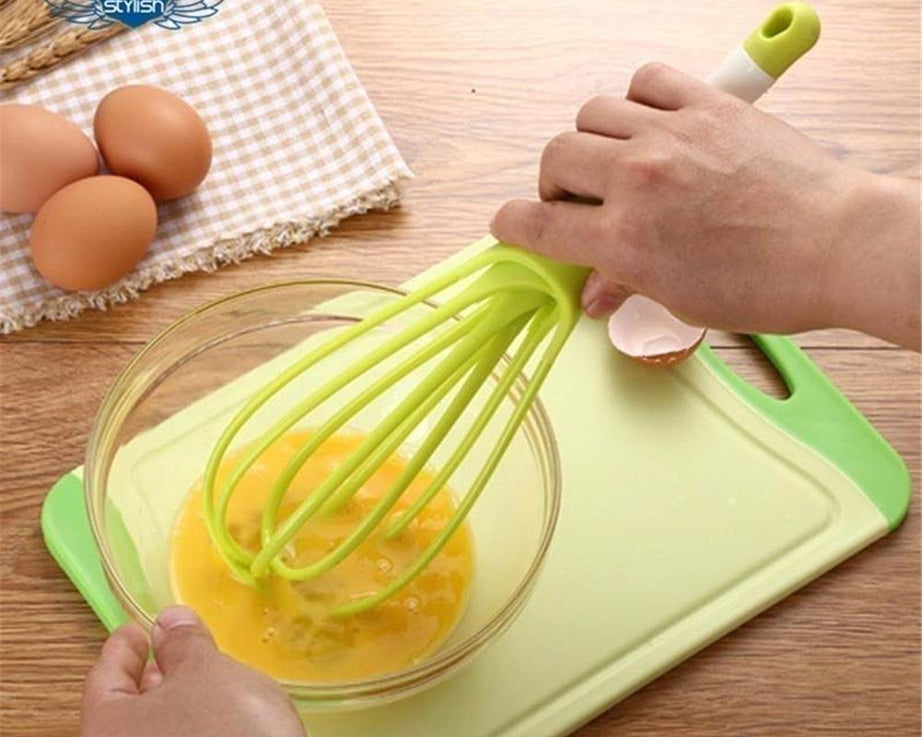 Handy plastic whisk mixer for whipping milk, coffee, eggs, and juice.