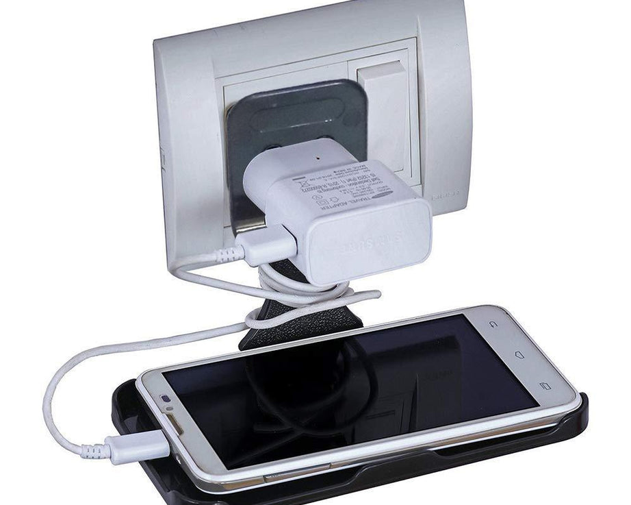 Stylish wall holder for charging mobile devices.