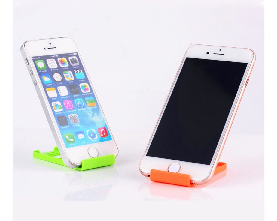 Universal phone holder stand that is portable and foldable.