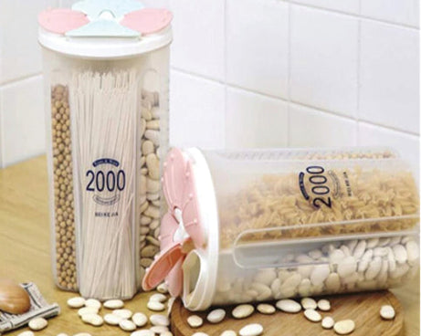 Transparent sealed 4-section storage box, ideal for kitchen organization.