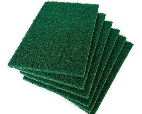 Green cleaning pads for removing dirt from utensils and tiles