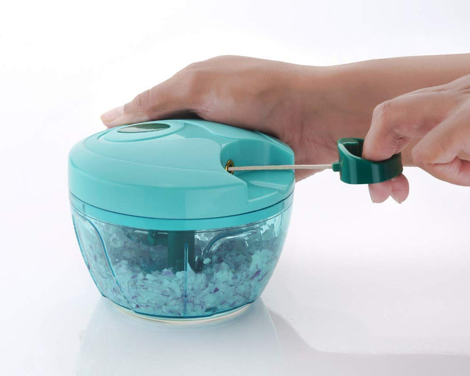 Vegetable chopper with stainless steel blades and brown package box.