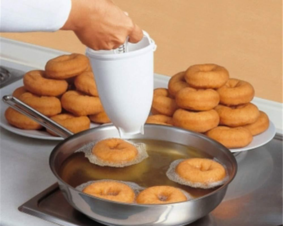 Simple donut and vada dispenser with easy grip for smooth operation.
