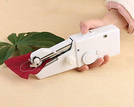 Portable sewing machine with thread and fabric