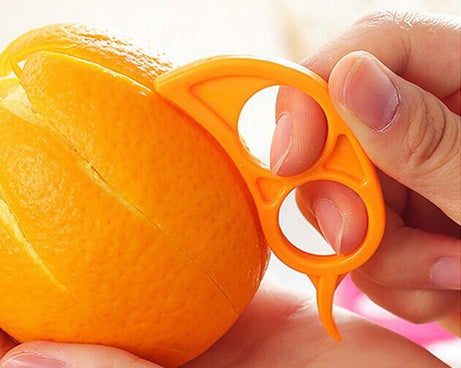 Ring-shaped peeler, snail design for oranges.