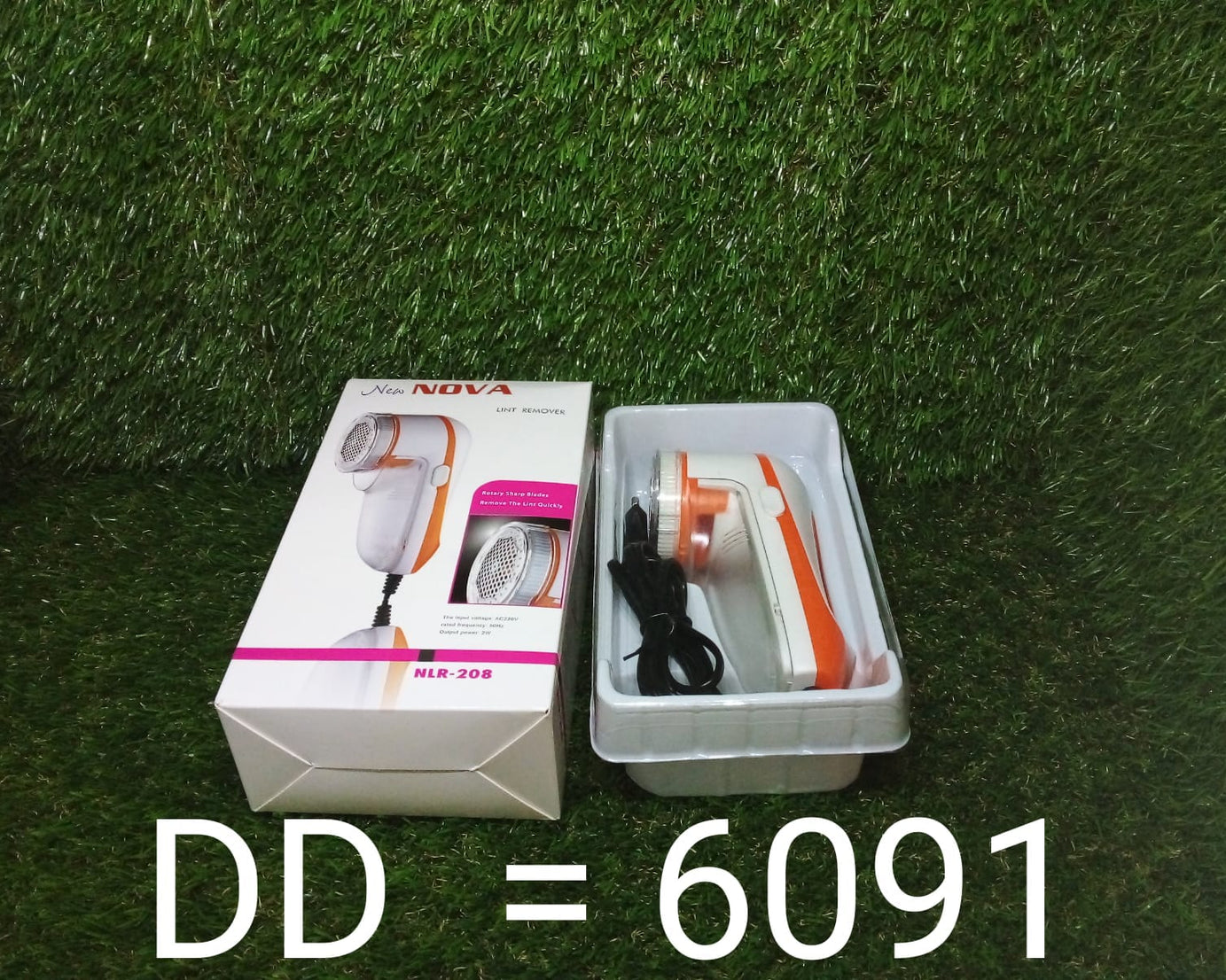 Lint remover tool with a focus on its handle and blade, designed for use on woolens and blankets