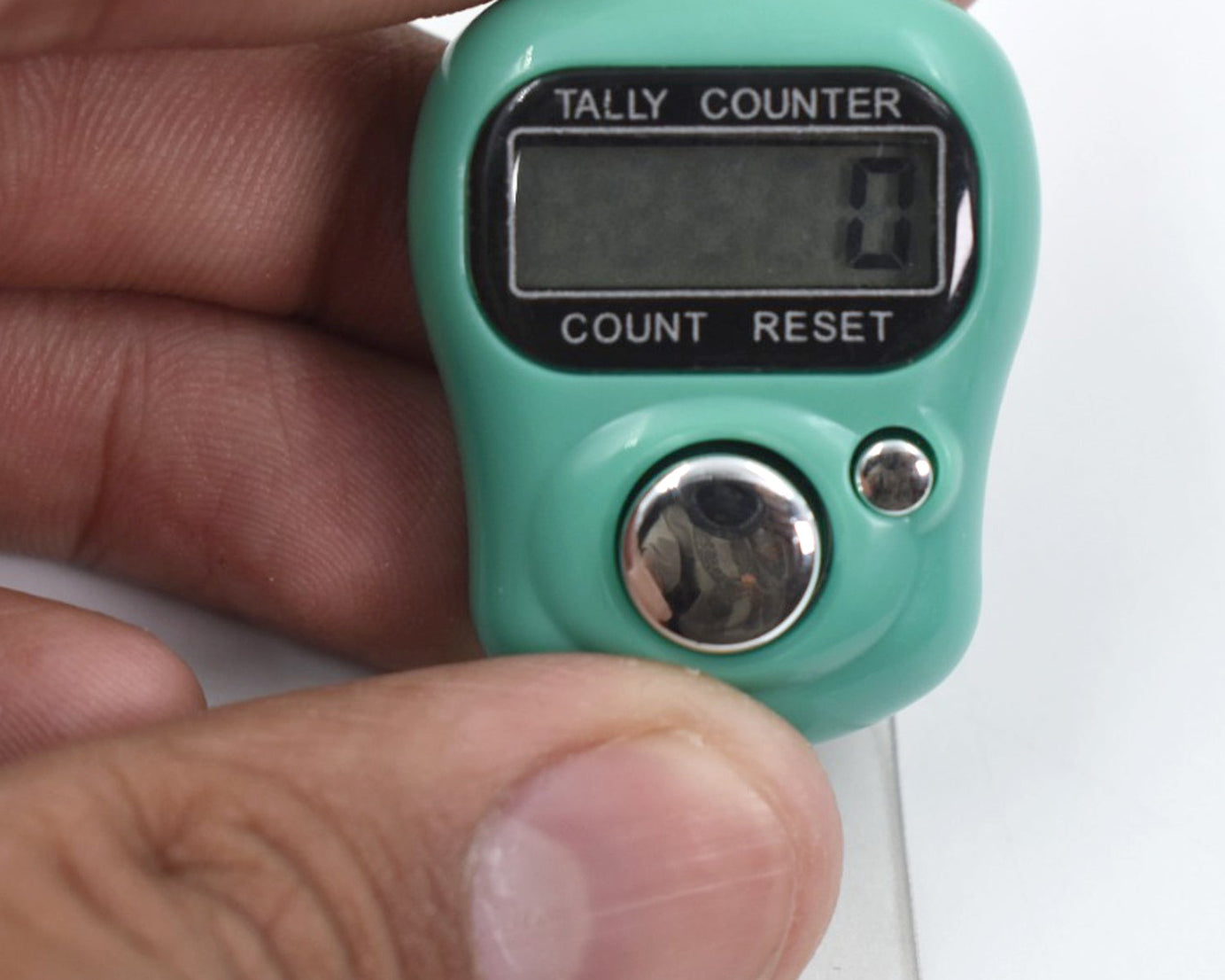Ergonomic tally counter with a sleek design for comfortable use.
