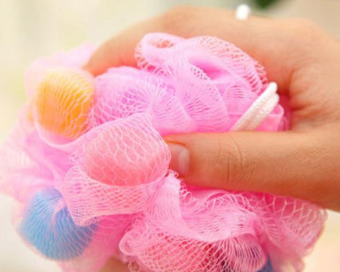 Exfoliating round loofah for bath and shower