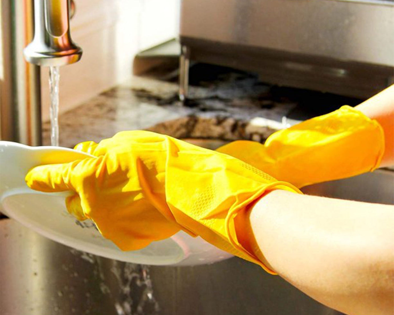 Yellow gloves for washing and cleaning tasks