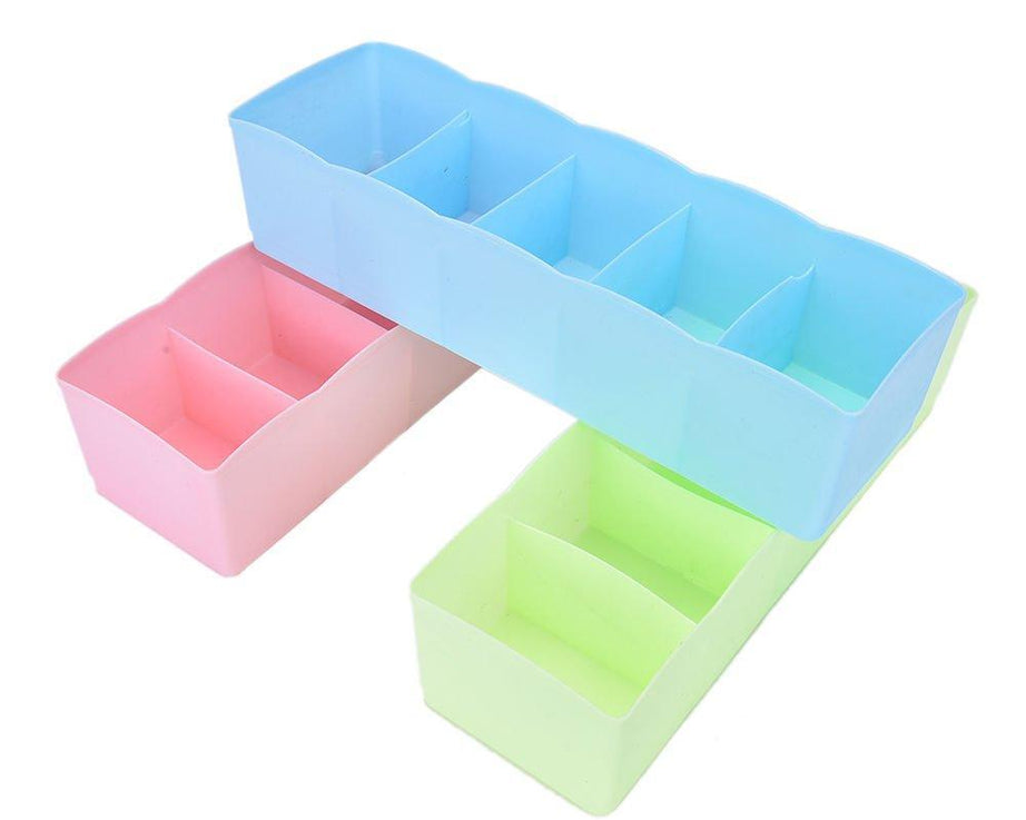 Compact 5-compartment storage organizer for socks and undergarments.