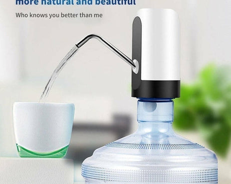 Dispenser in use with water bottle, highlighting the pump function