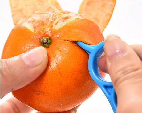 Ring-shaped peeler for oranges, snail design.
