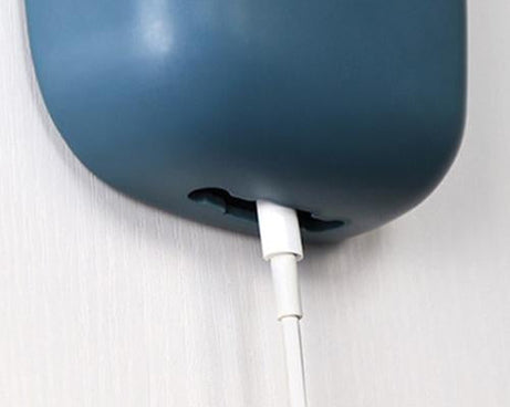 Wall-mounted charging holder.