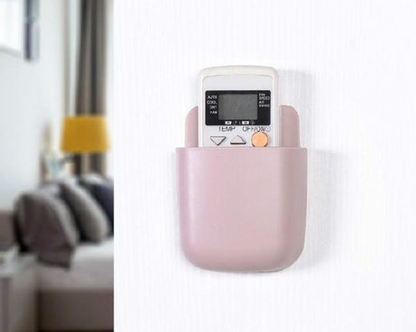 Wall-mounted phone holder.