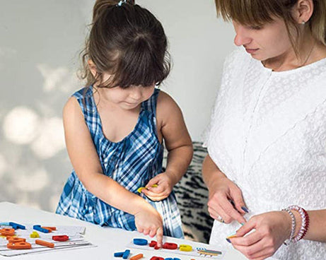 Assorted magnetic letters on a surface