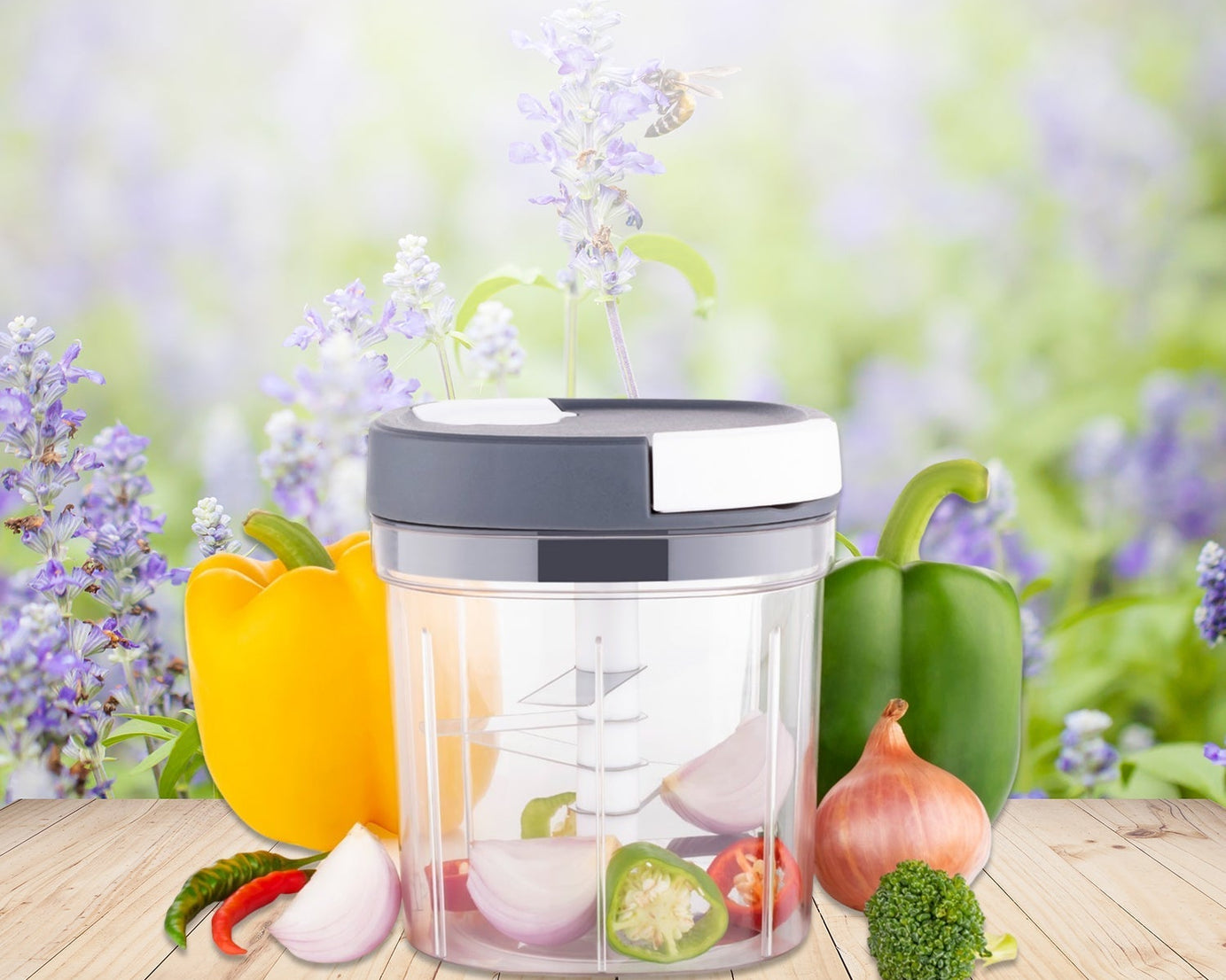 Kitchen tool with a 2 in 1 function for chopping and slicing, featuring a 600ML capacity