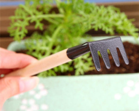 Children's garden tools set with trowel, shovel, rake