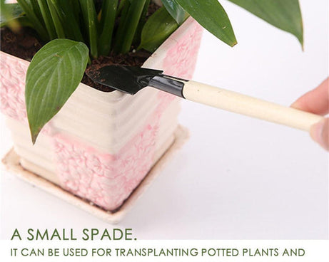 Kid's gardening trowel, shovel, and rake set