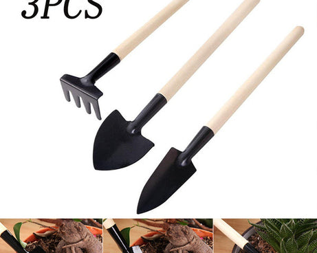 Kid's garden tool set with trowel, shovel, and rake