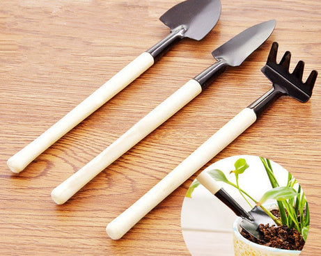 Set of 3 kid's garden tools including trowel, shovel, rake