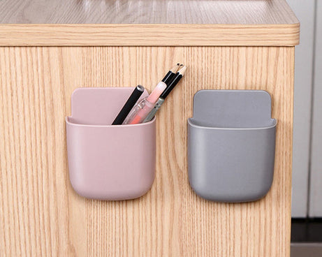 Storage case with phone charging holder.