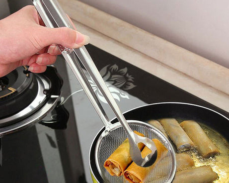 Stainless steel filter spoon with clip for frying and cooking.