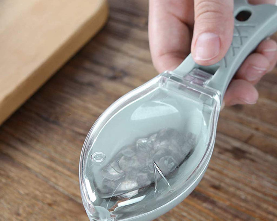 Ergonomic fish scale scraper and skin peeler for easy use.
