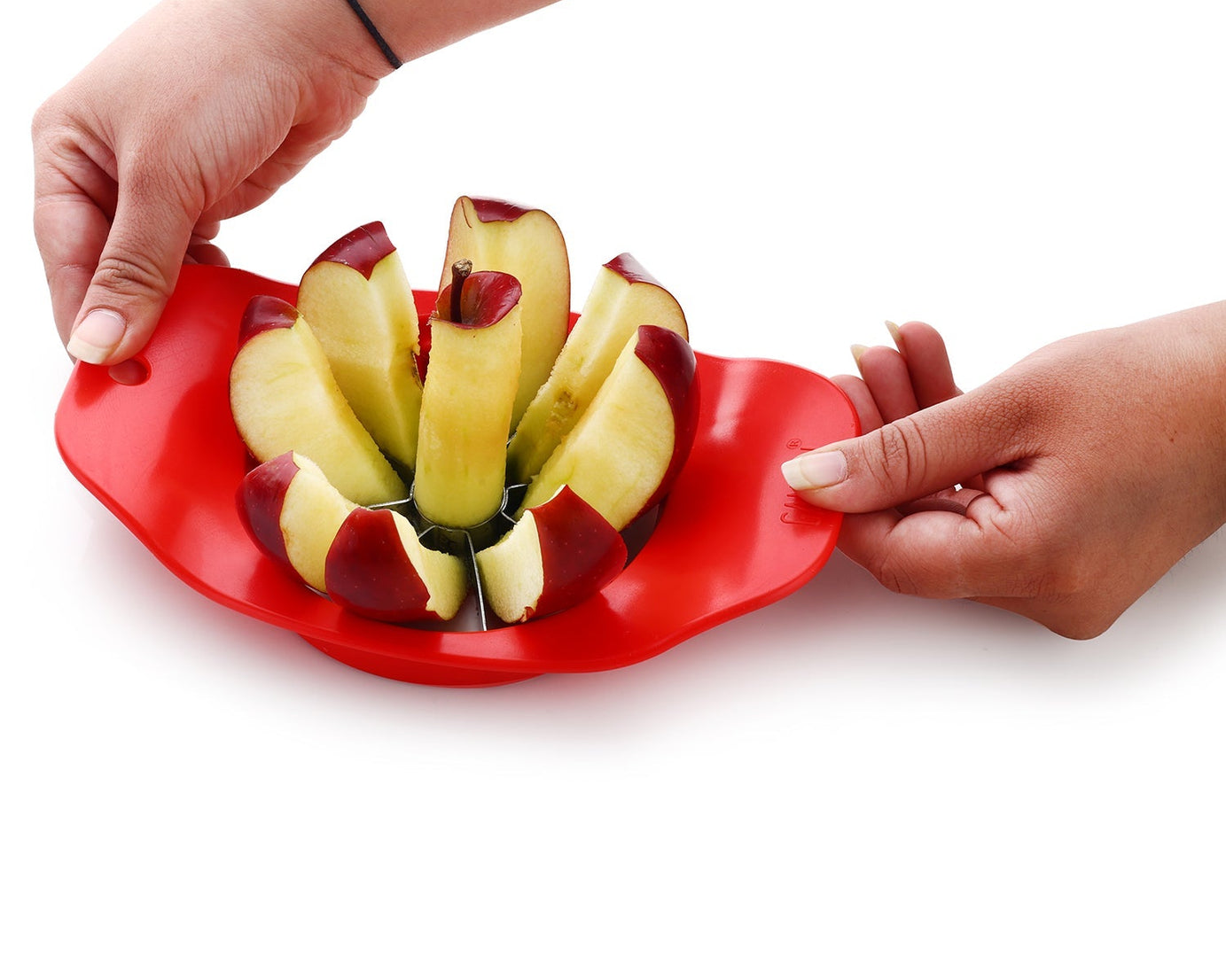 Apple cutter by Ganesh, plastic and stainless steel, colors may vary.