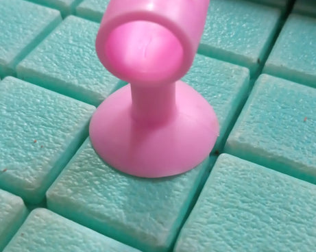 Mini silicone door stopper with anti-collision crash pad.