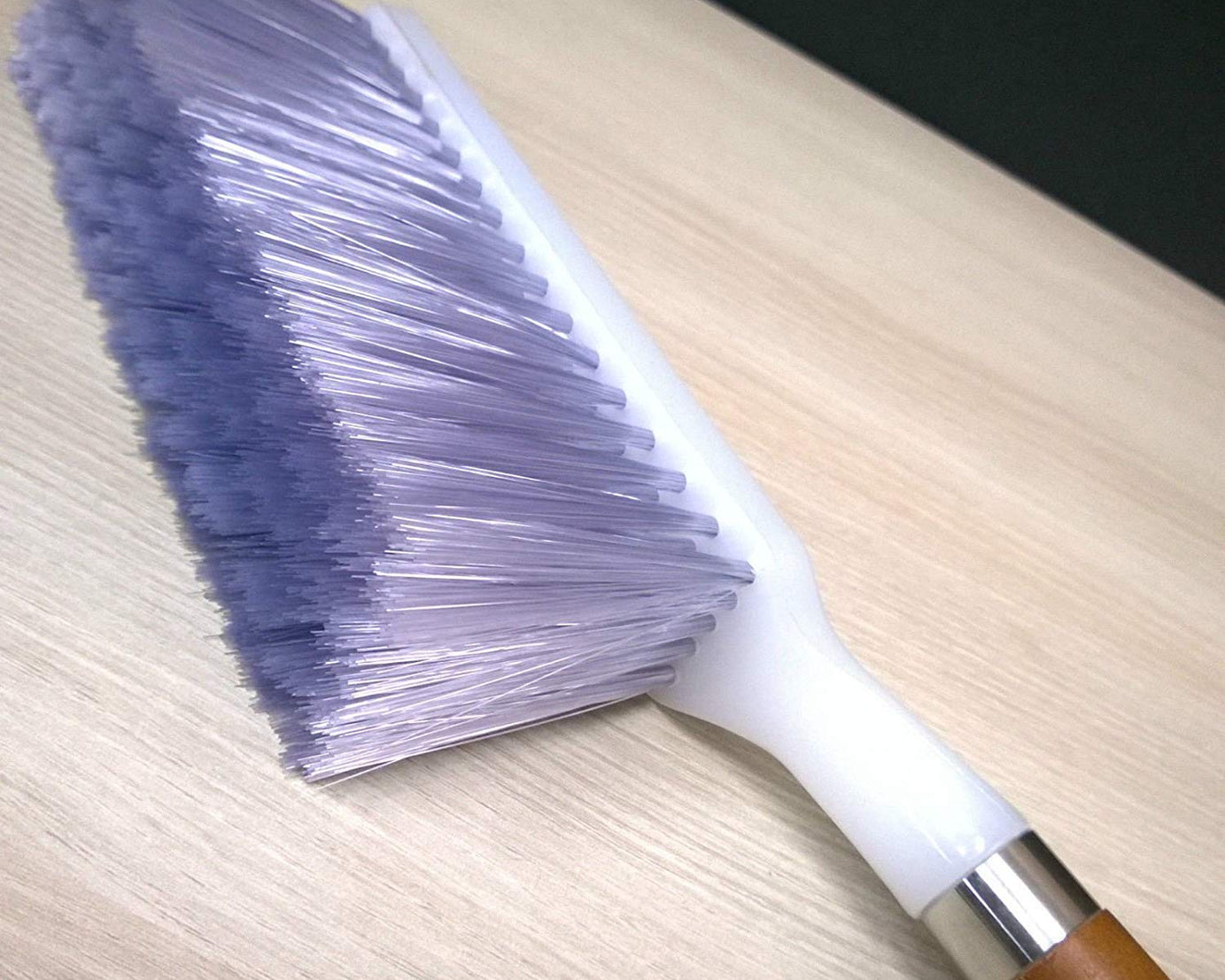 Efficient household cleaning brush with firm bristles