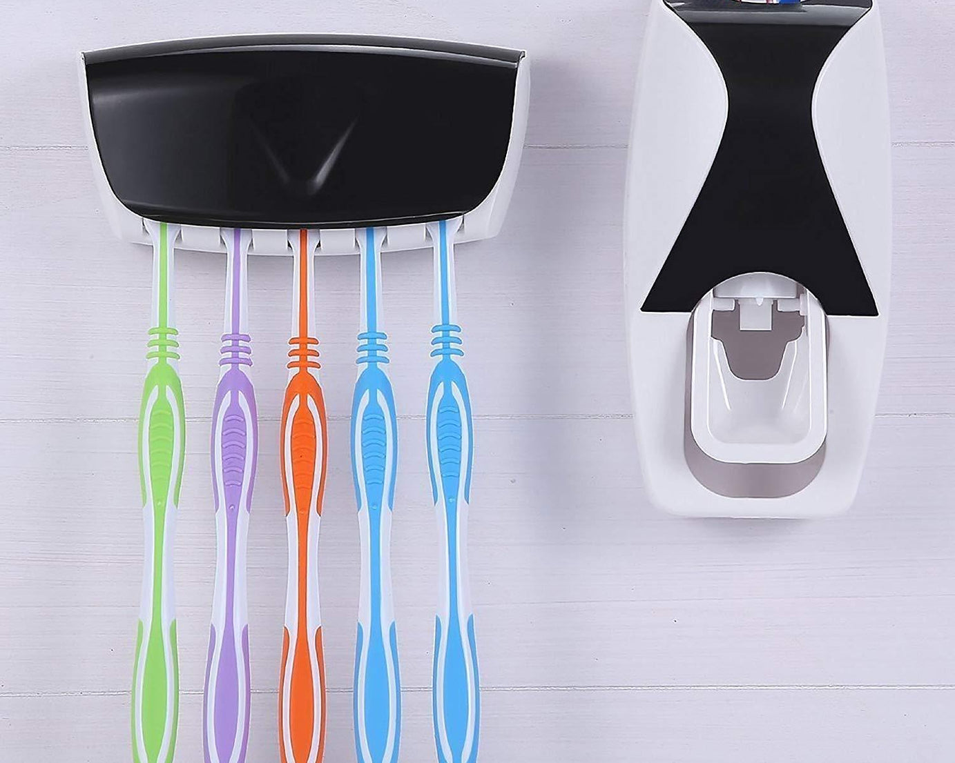 Toothpaste dispenser with toothbrush