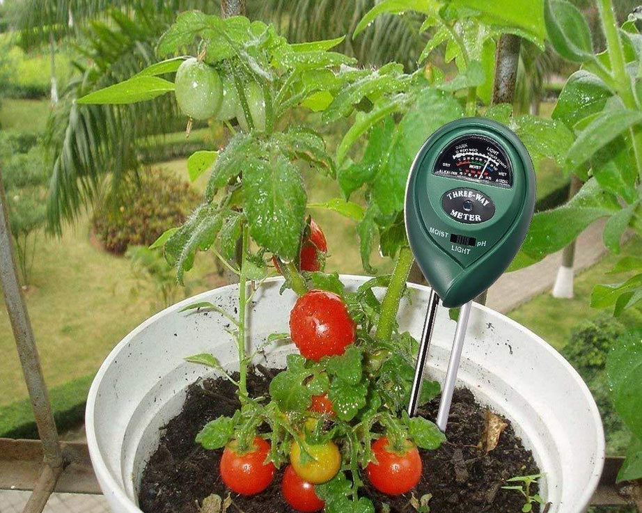 Green 3-in-1 soil meter for plants.