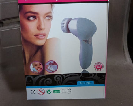 Pink 5-in-1 facial and body massager.