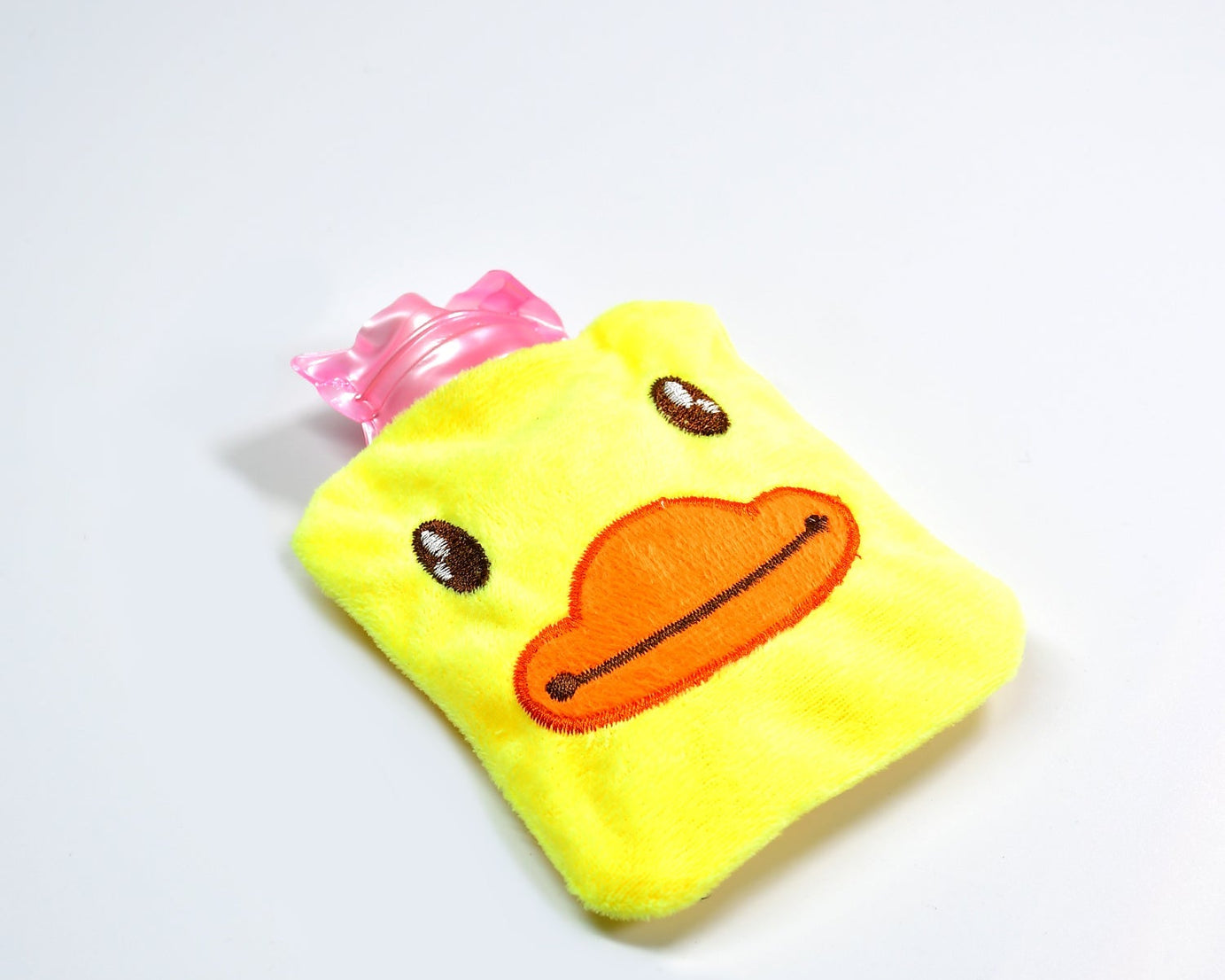 Small hot water bag with a yellow duck cover for various pains
