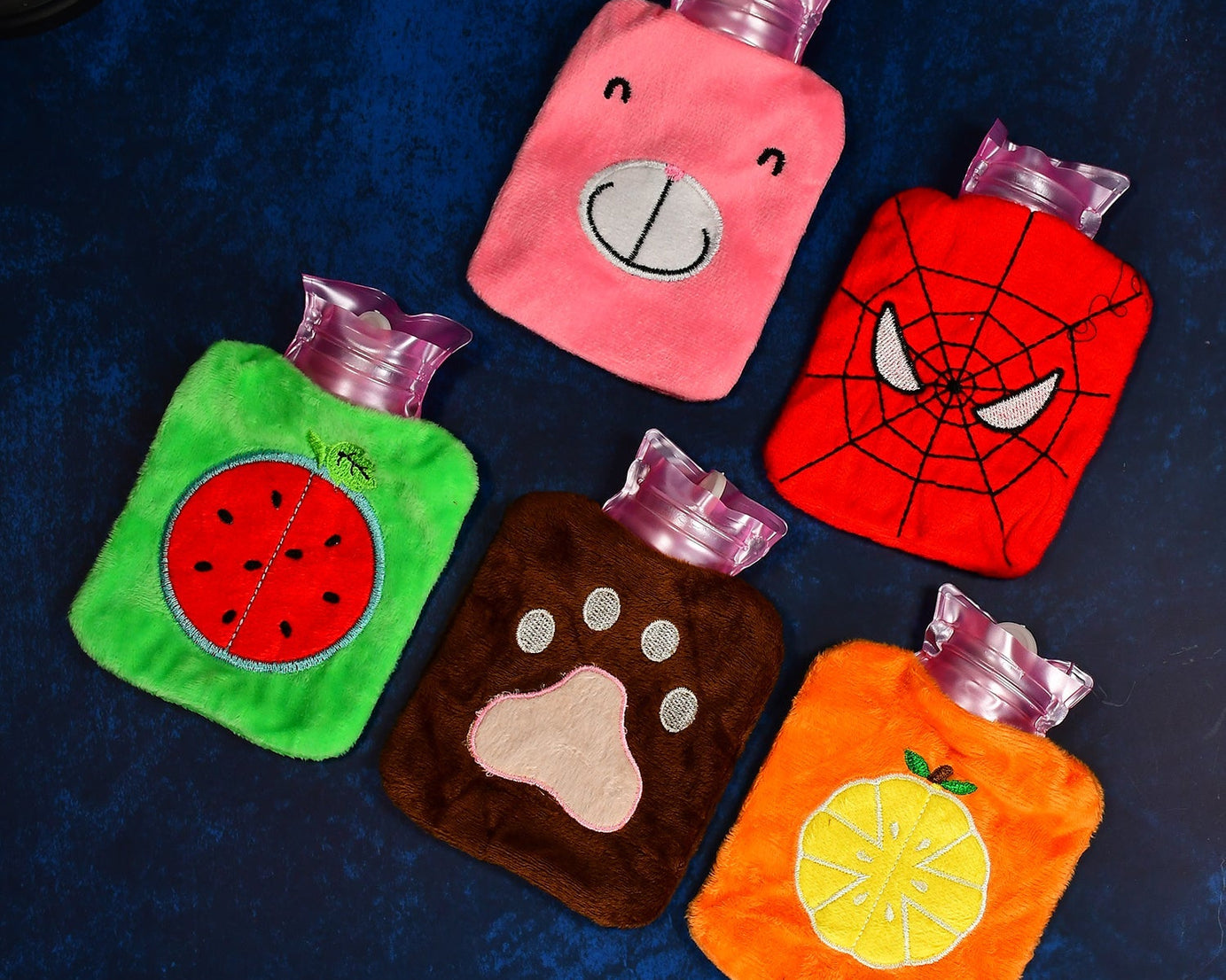 Mini hot water bag for soothing pain relief, comes in different designs