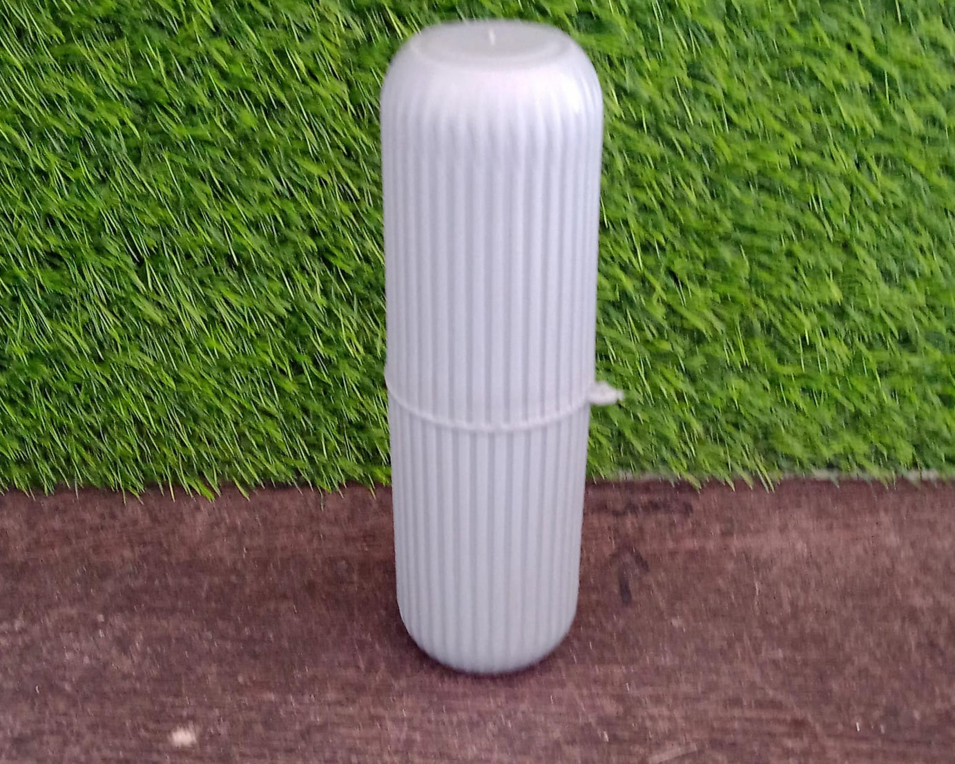 Travel storage bottle, capsule shape, with detailed texture