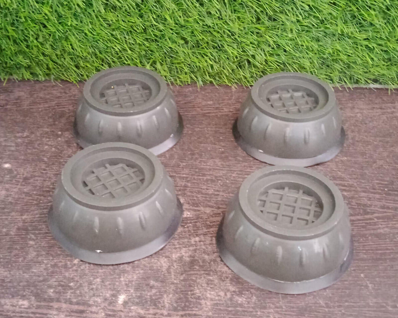 Vibration dampening pads with suction cups